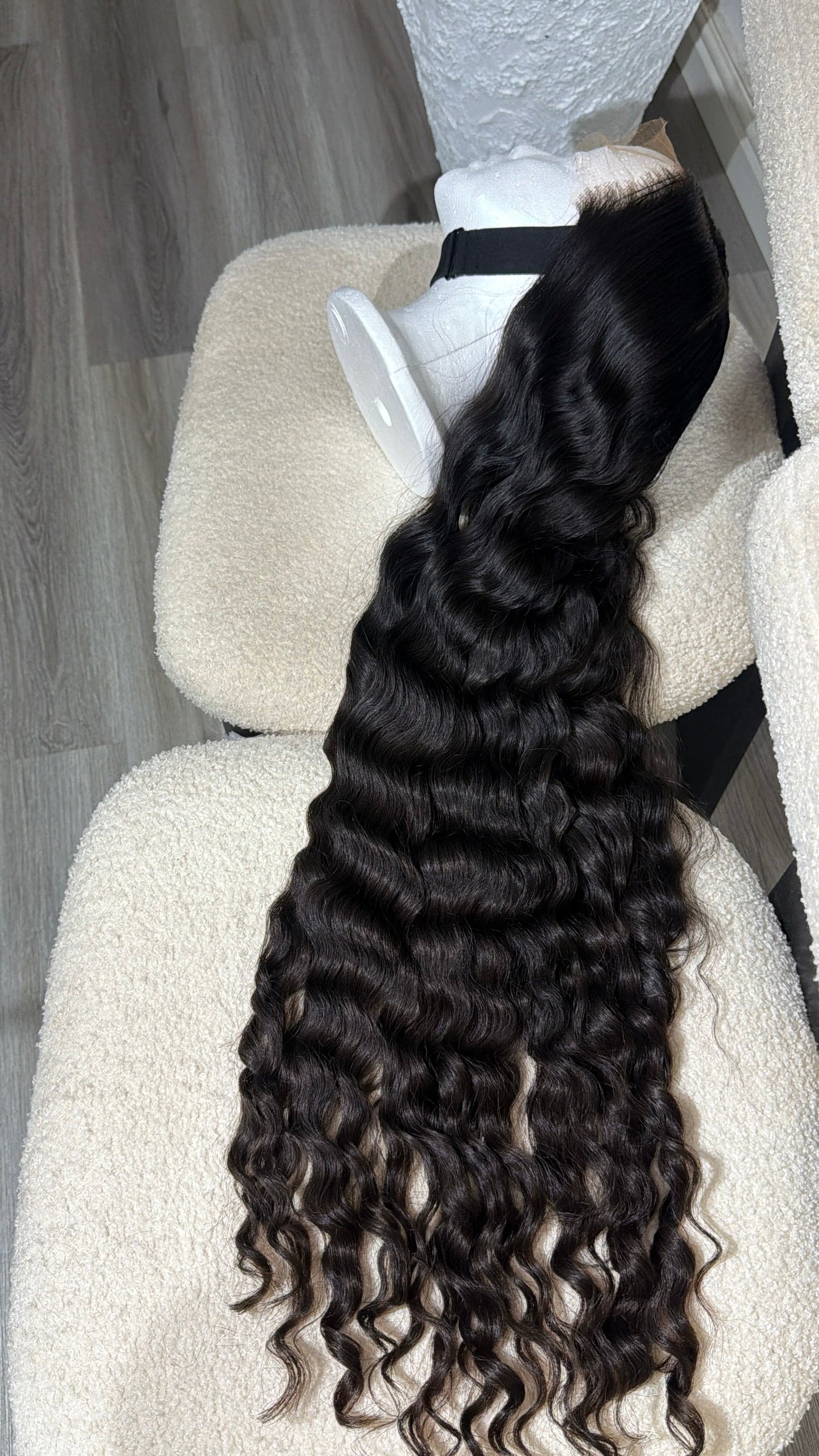 Luxury Russian Curly raw human hair wig with premium HD lace closure, soft defined curls and a natural-looking hairline.