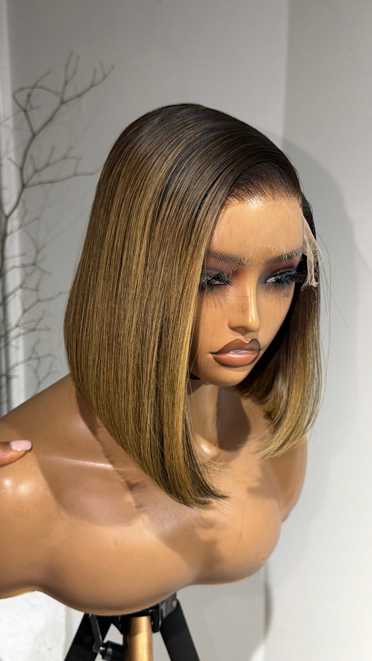 Back view of the Golden Chai Bob 10–12-inch raw human hair wig showcasing its rich golden chai colour, polished bob cut and premium 6x6 HD lace closure.