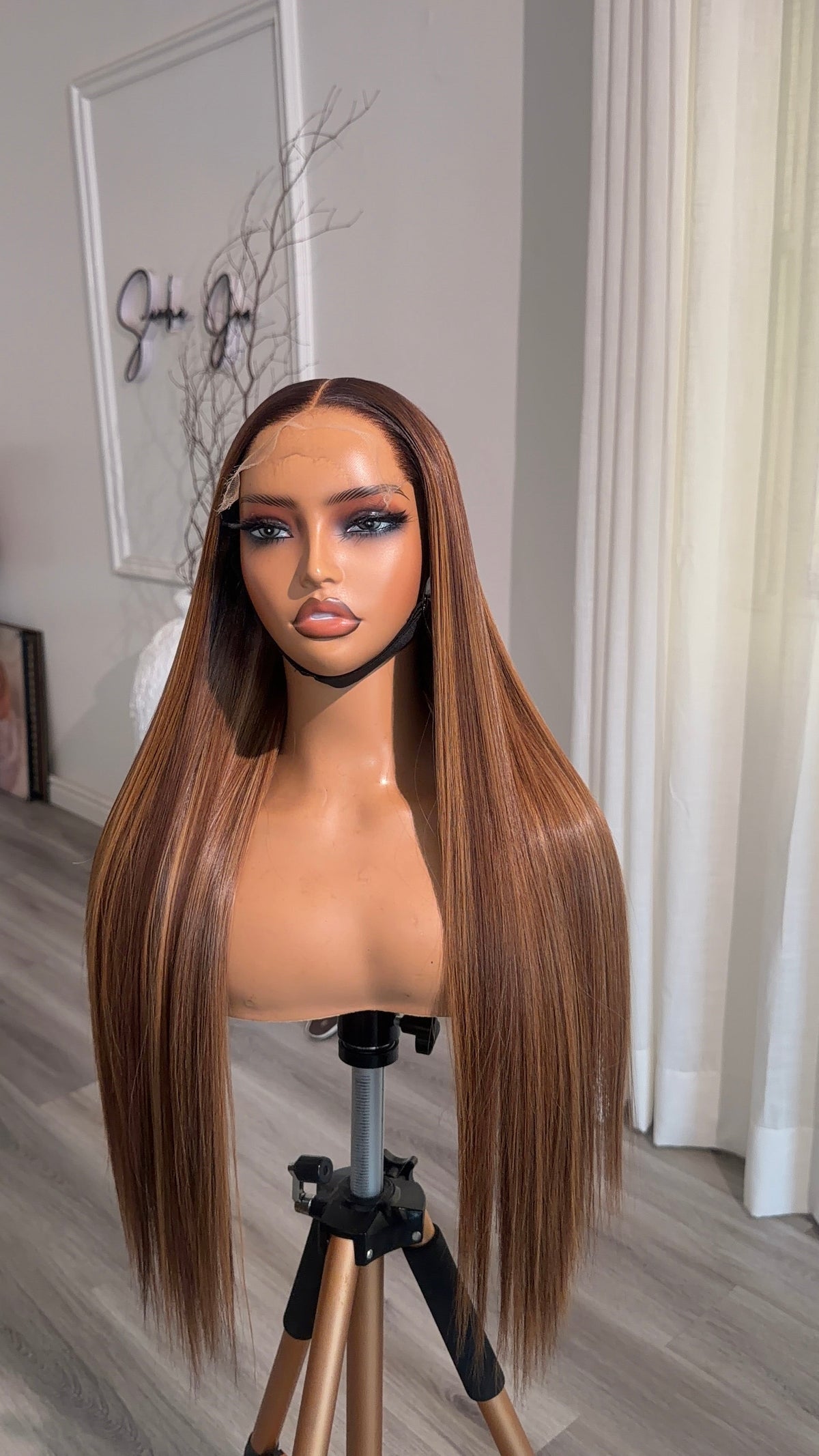 Side view of the Honey Chestnut 22-inch human hair wig featuring a seamless 6x6 HD lace closure and a natural chestnut finish.