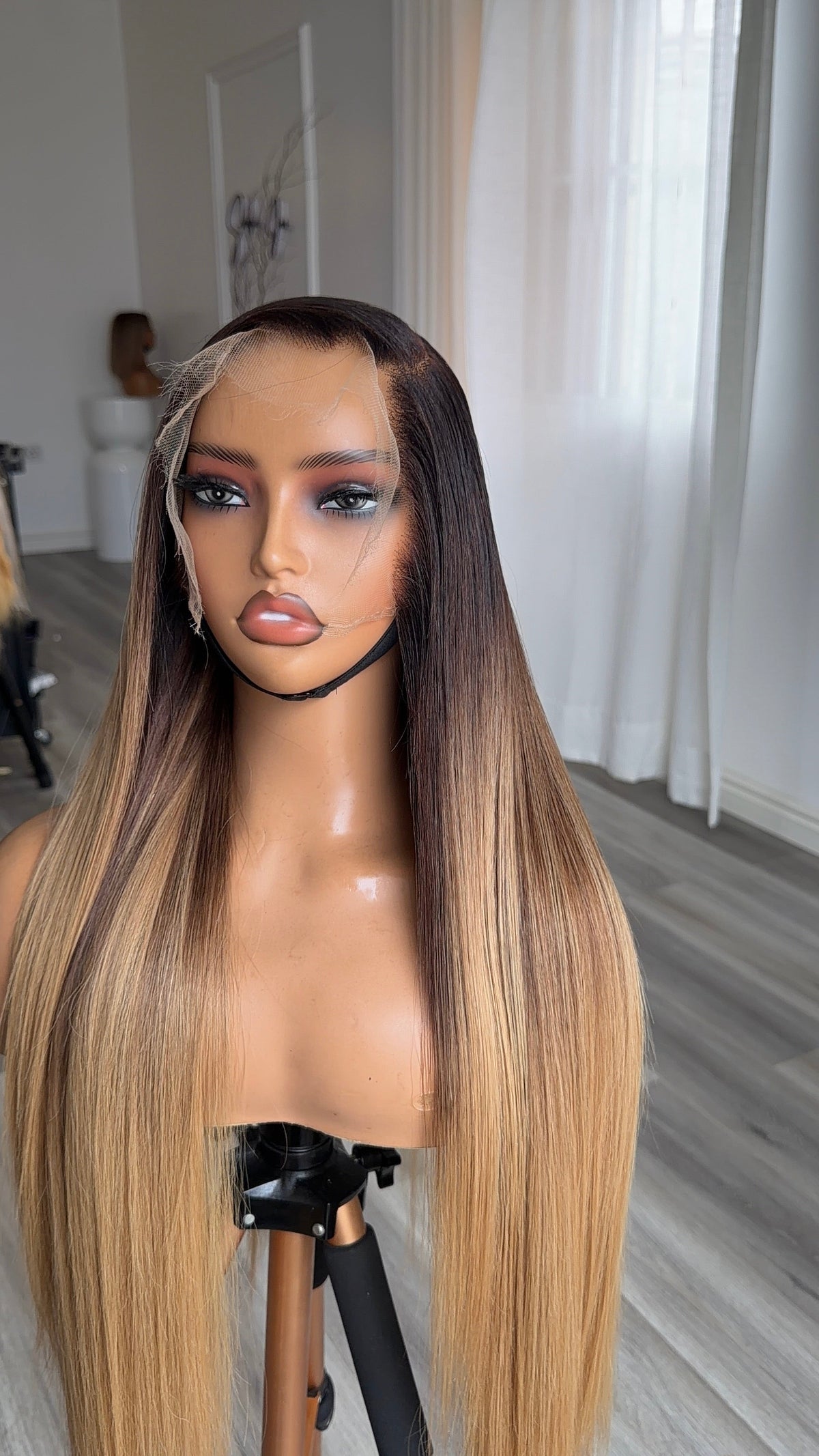 Luxury Oak Blonde HD lace human hair wig styled with a natural hairline.