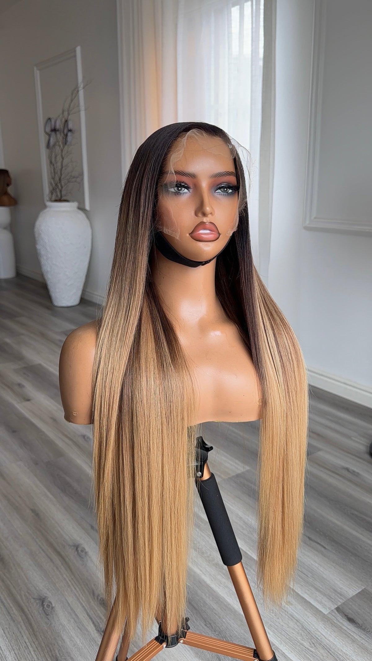 Side view of the Oak Blonde 26-inch straight human hair wig with HD lace frontal.