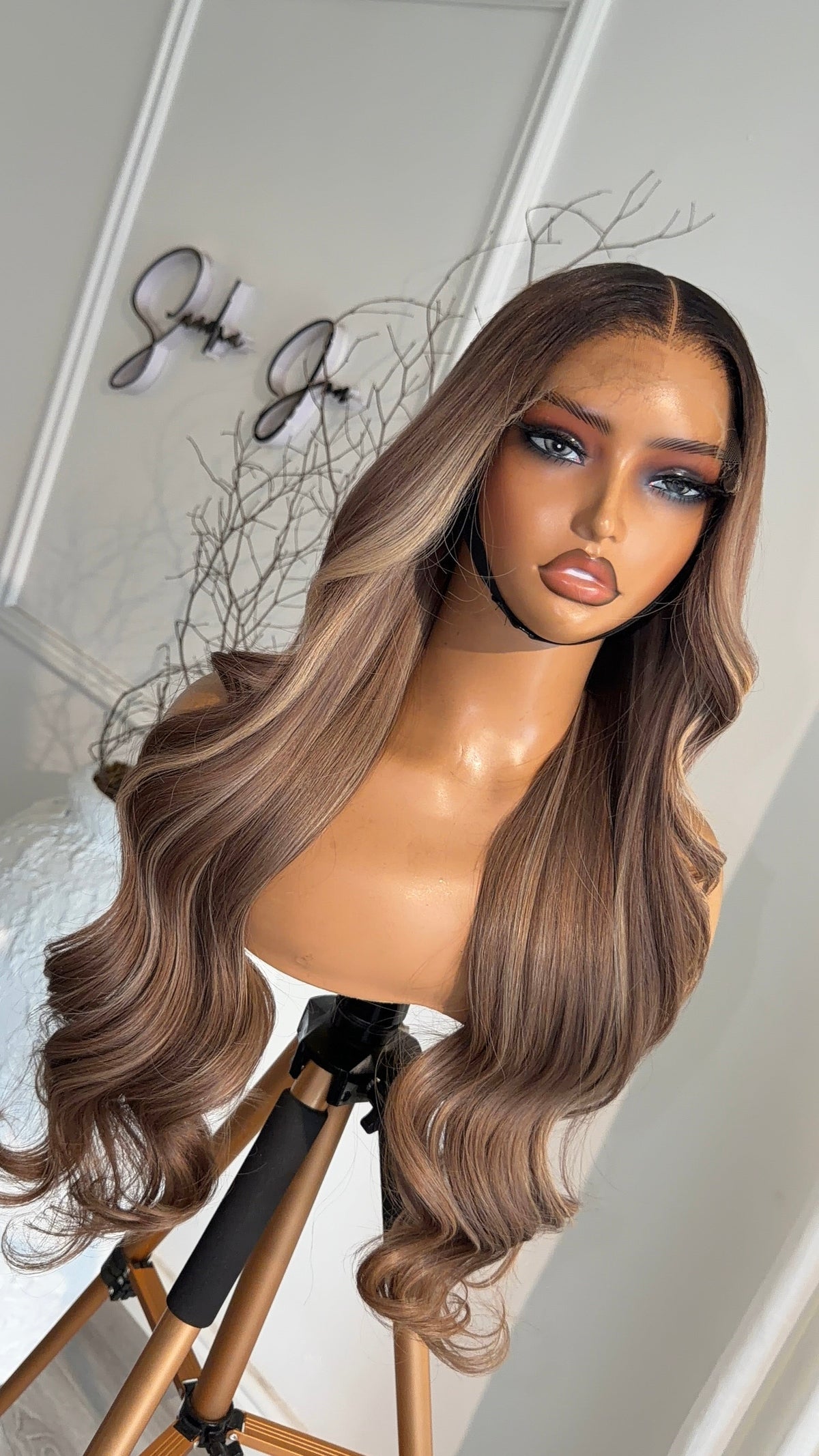 Back view of the Pearl Unit 24-inch human hair wig showcasing smooth length and premium HD lace closure