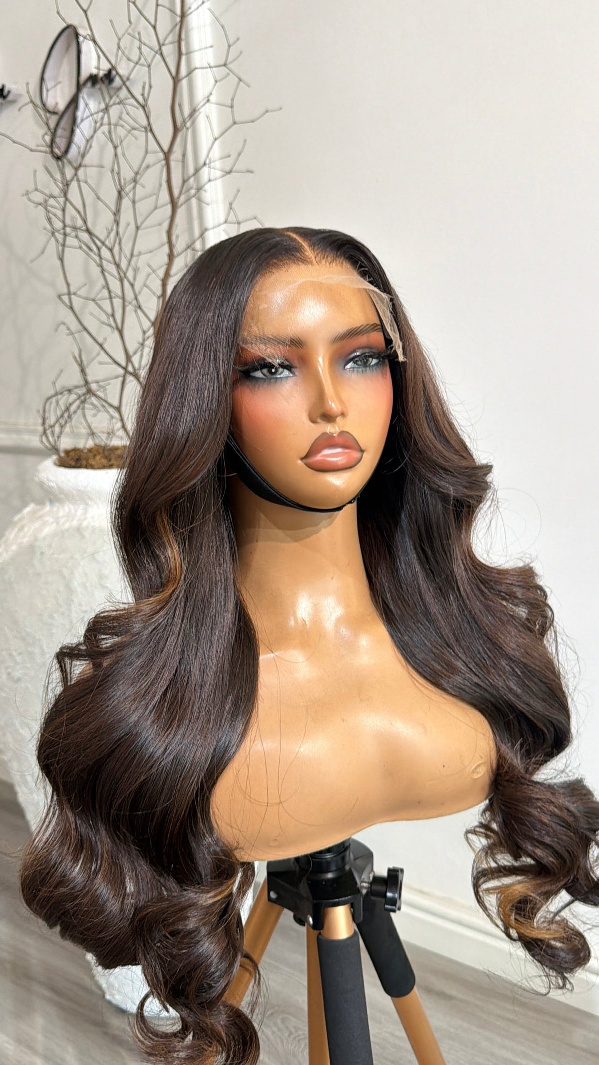 Back view of the Warm Chocolate 24-inch raw human hair wig showcasing its rich chocolate tone, smooth texture and premium 6x6 HD lace closure.